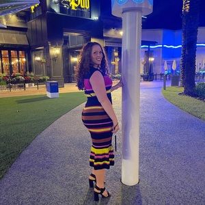 Cute striped dress! Hugs curves
